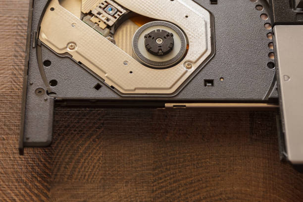 istock Open the optical drive on a laptop without a drive 1186085101