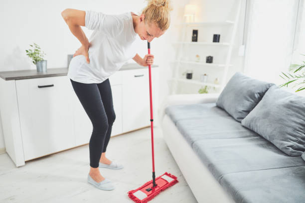 istock Injury while cleaning the house and doing daily housework. 1186087118