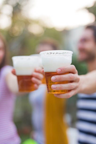 istock Friends enjoying drinking beer in the backyard. 1186090610