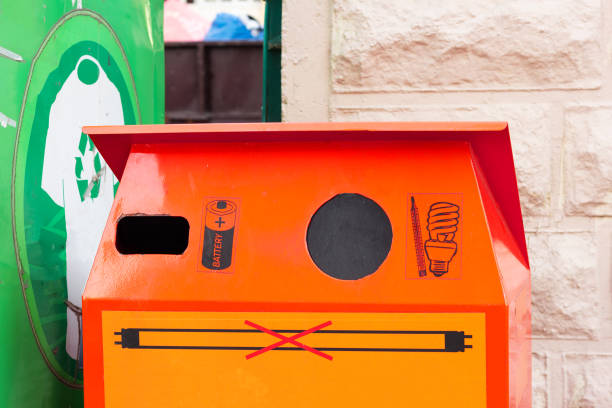 istock garbage point disposal of batteries and bulbs. eco management system 1186093057