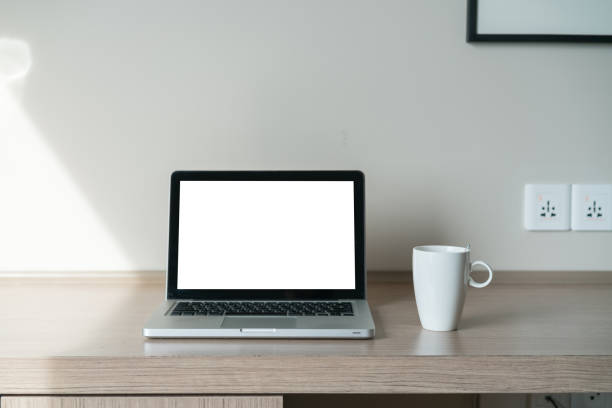 istock Laptop on a desk with lamp 1186093505