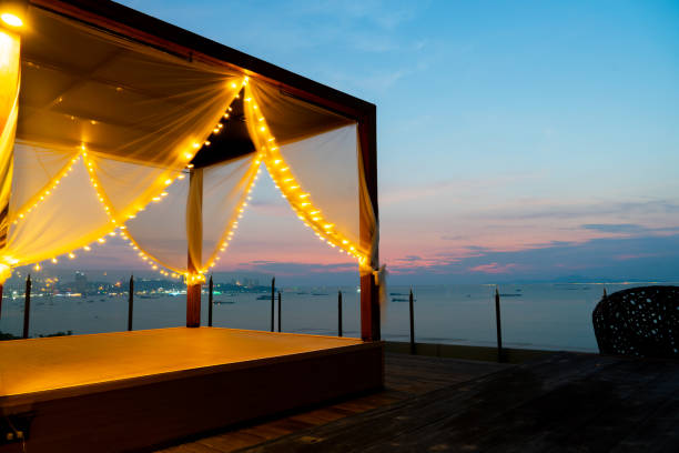 Beach daybed tent at sunset