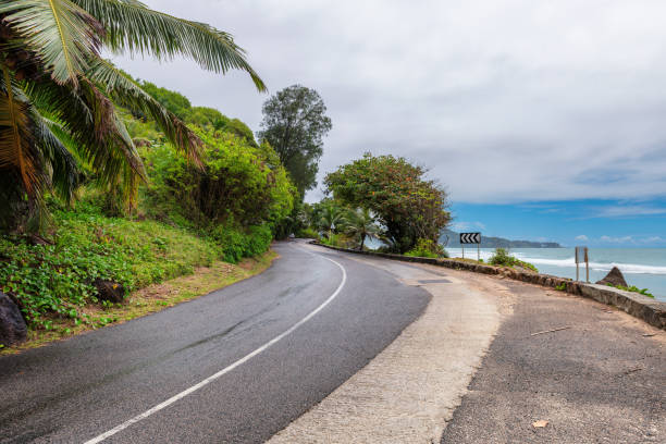 istock Beach road on tropical island 1186094587