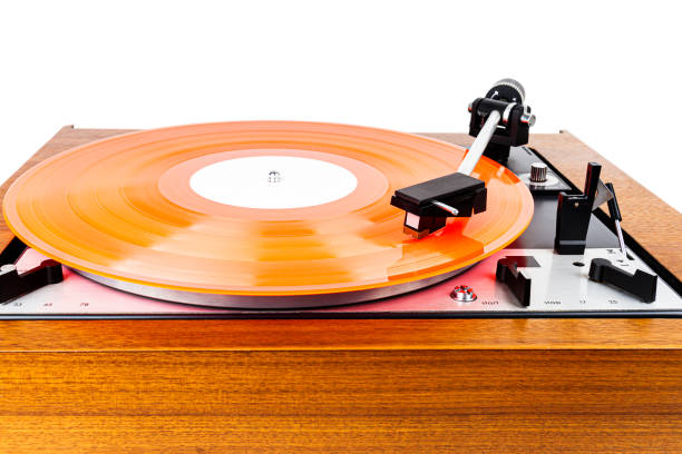 istock Vintage turntable with a red vinyl isolated on white 1186096459
