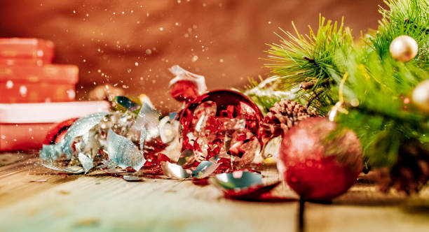 istock Glitter being scattered over a broken Christmas ball 1186096665