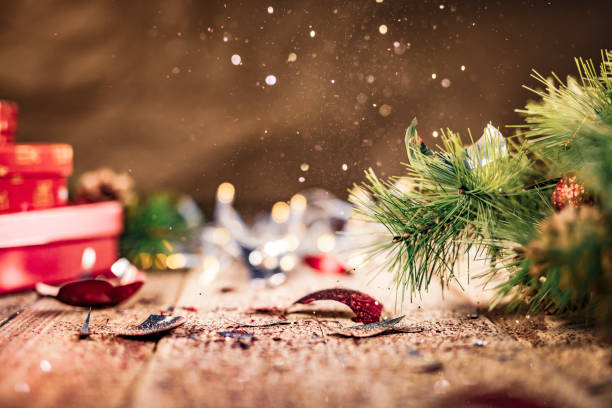istock Glitter being scattered over a broken Christmas ball 1186096905