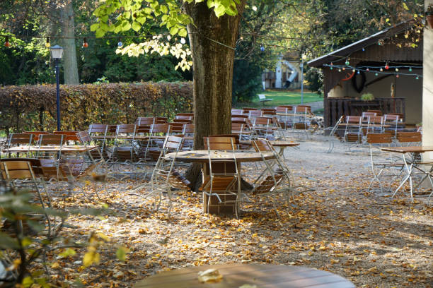 istock Benches and chairs at tables invite you to relax and unwind 1186097014