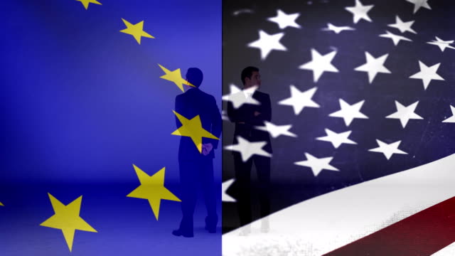 Flag of Europe beside the flag of the United States and two men