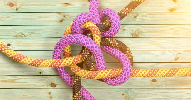 Rope. Knot on a colorful cord  on wooden background lace fastener photos stock pictures, royalty-free photos & images