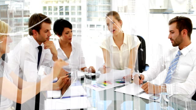 Business people discussing in an office and graphs 4k