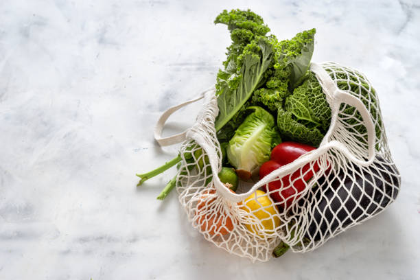istock Zero waste concept. Vegetables and friuts in net bags 1186101841