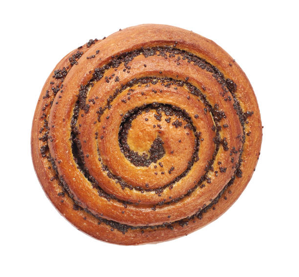 istock bun with poppy seeds isolated on white. Top view 1186105985