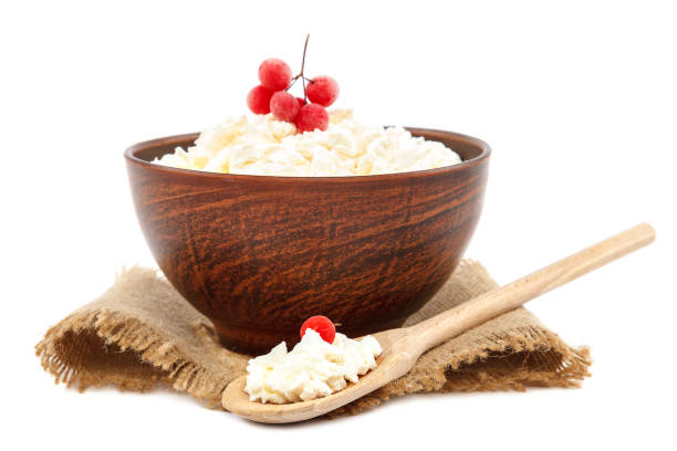 istock Fresh cottage cheese isolated on a white background 1186109691