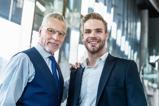 istock Portrait of two businessmen looking in camera 1186109999