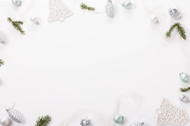 istock Christmas composition. Christmas balls, blue and silver decorations on white background. 1186111380