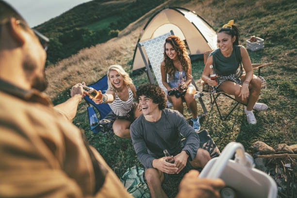 istock Friends Camping Together 1186111593