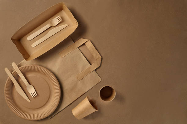 istock Eco friendly disposable tableware. Biodegradable craft dishes. Recycling concept. Also used in fast food, restaurants, takeaways, picnics. Close-up 1186113857