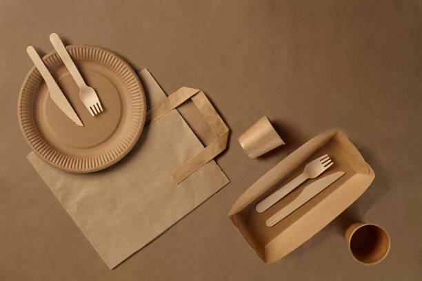 istock Eco friendly disposable tableware. Biodegradable craft dishes. Recycling concept. Also used in fast food, restaurants, takeaways, picnics. Close-up 1186114024