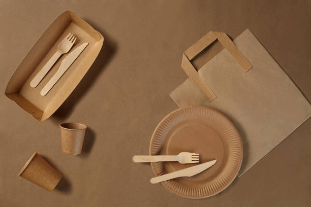 istock Eco friendly disposable tableware. Biodegradable craft dishes. Recycling concept. Also used in fast food, restaurants, takeaways, picnics. Close-up 1186114131