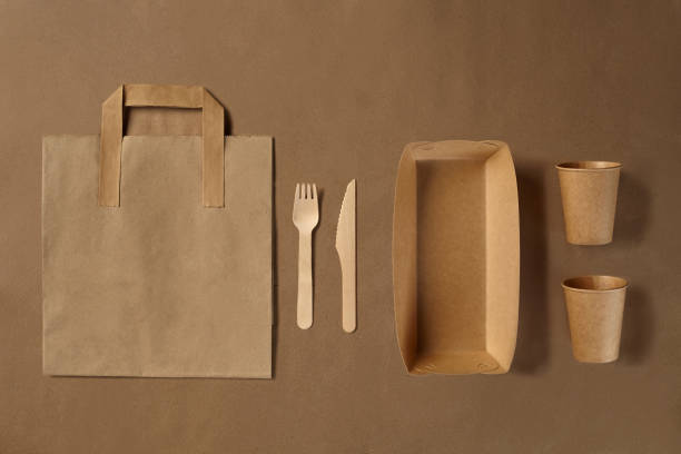 istock Eco friendly disposable tableware. Biodegradable craft dishes. Recycling concept. Also used in fast food, restaurants, takeaways, picnics. Close-up 1186115894