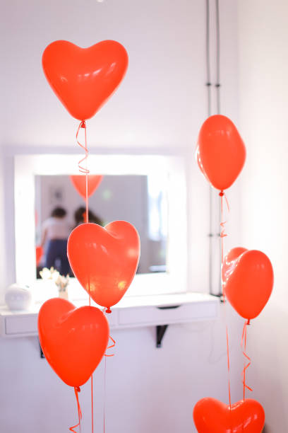 istock Paper heart decorations in room 1186117934
