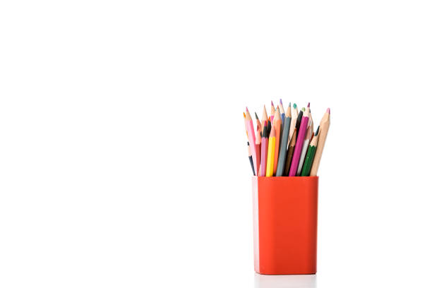 istock pen holder with multicolored pencils on white 1186117988