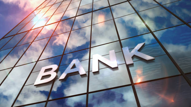 istock Bank glass skyscraper with mirrored sky 1186119566