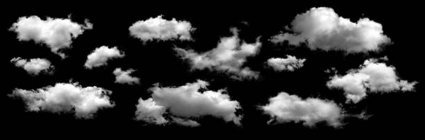 istock Group of white clouds isolated on black background. 1186121227