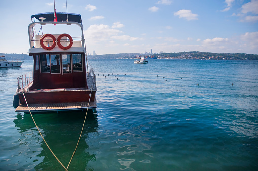 Boats in Bosphorus shore\nBeykoz Istanbul Turkey \nIt is a small sailing point for fishing boats or private boats especially