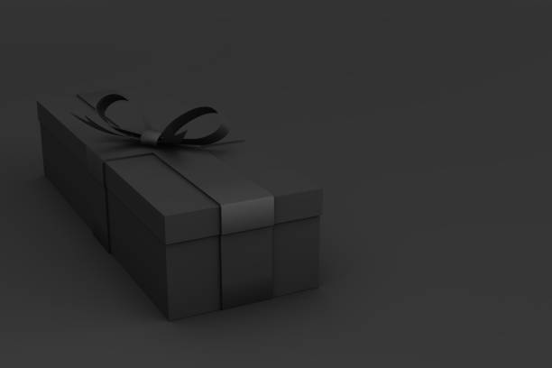 3d rendering of black gift box with black ribbon on black background. Birthday or anniversary present\nEmpty space for party, promotion social media banners, posters.