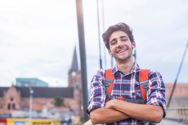 istock young latin man traveling alone 1186126106