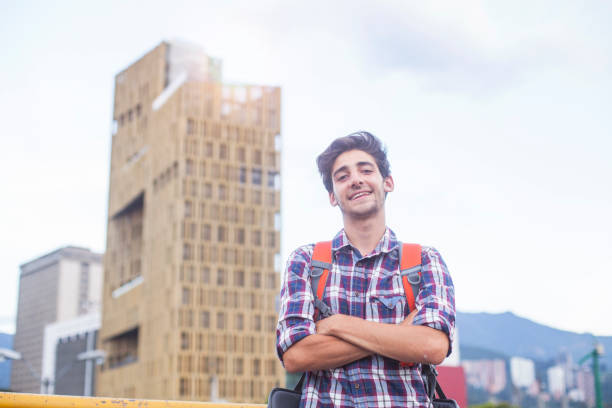 istock young latin man traveling alone 1186126173