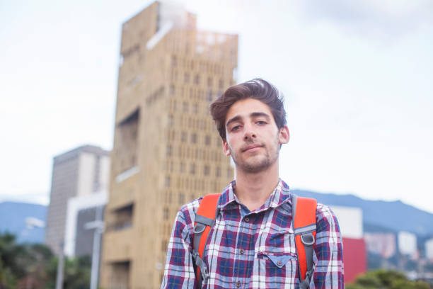 istock young latin man traveling alone 1186126226