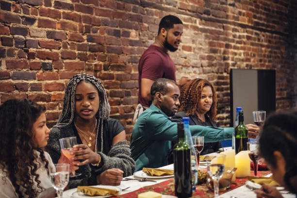istock Multi-generation ethnic family preparing Thanksgiving dinner 1186126938