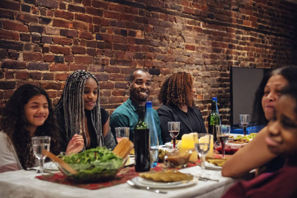 istock Multi-generation ethnic family preparing Thanksgiving dinner 1186127008
