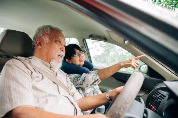 istock Happy Senior Couple Going For a Drive 1186128510