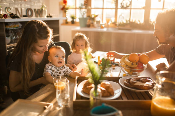 istock Smiling family having breakfast 1186129213