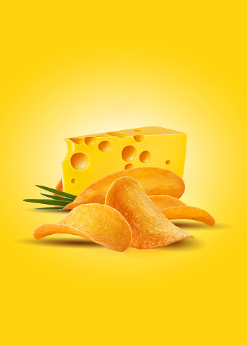 Piece of a palatable, fresh cheese with chips or crisps and green onion on a yellow background with copy space for your text or images. Shadow. Advertising concept. Close-up shot.