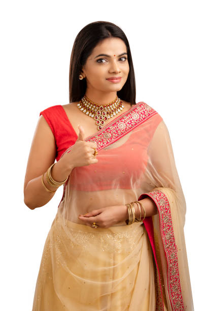 親指を上に手のサインを示すかなりインドの若いヒンズー教の女の子。 - thumbs up jewelry hinduism women ストックフォトと画像