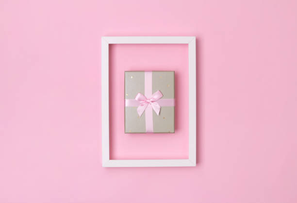istock Boxing day template. Gift box in frame on pastel pink background. 1186132458