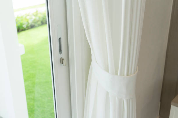 istock Close up of draperies at a window. 1186132510