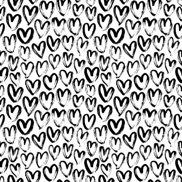 istock Heart seamless pattern. Black and white ink brush hearts hand drawn ornament. Romantic figures vector illustration. 1186132537