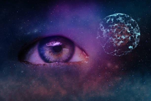 istock Close up Abstract eye concept looking on a cell dividing. Nebula dust in infinite space backgroud. Mixed media. 1186133864
