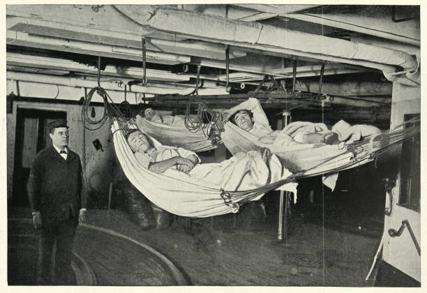 Vintage photograph of Royal navy sailors sleeping in hammocks, HMS Alexandra, 19th Century.