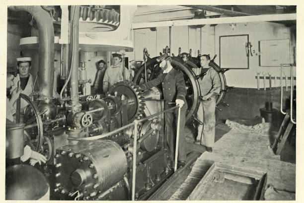 Old Sepia Picture Of An Old Steam Engine In a Locomotive shed