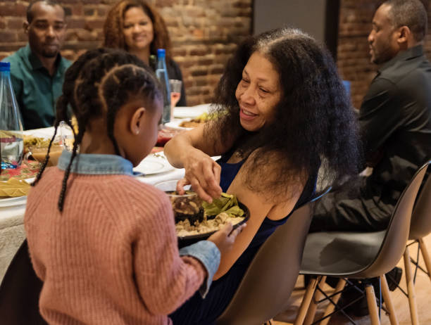 istock Multi-generation family enjoying Thanksgiving dinner. 1186137490