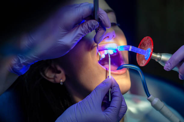 Girl receiving dental care stock photo