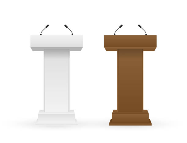 istock White and brown Podium Tribune Rostrum Stand with Microphones. Vector stock illustration. 1186142196