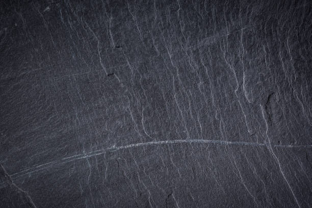 istock Dark grey and black slate background or texture 1186142852