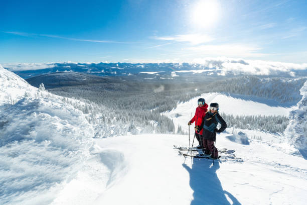 istock couple on a ski hill 1186143234